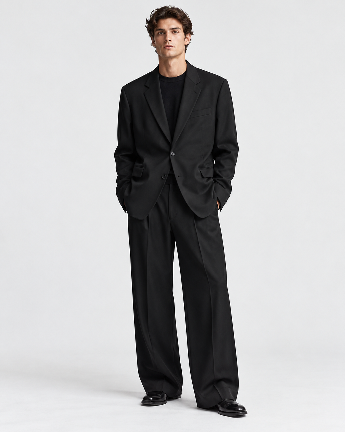 DFCOLOR::Black::onbody-front — Black Oversized Wide-Leg Two-Piece Suit — single-breasted two-button black serge suit, full-length studio view